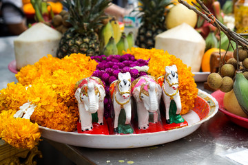 flowers fruits and horses dolls for making offerings or sacrifice to the spirits