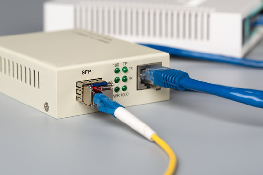 1Gbps optical media converter with SFP module connected to ethernet port SOHO router