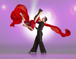Couple ballroom dancing on illumination