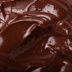 Texture of smears of soft chocolate for a background. Selective focus