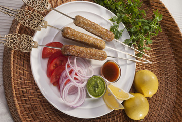 Chicken minced Shish Kebab with vegetable and mint dip  