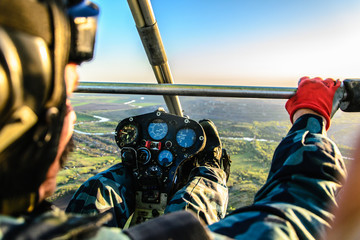 View from cockpit at flight by hang glider