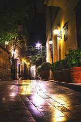 Old city street, stone stairway, lights at night. Kaleici, Antalya, Turkey