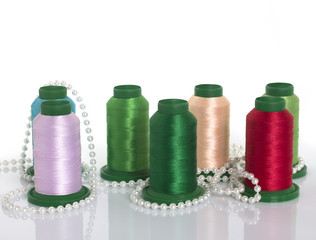 Satin ribbons, silk threads, pearls. Everything for sewing and needlework