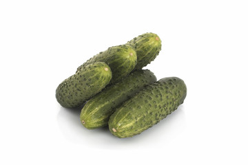 Real green cucumbers on a white background. Isolated