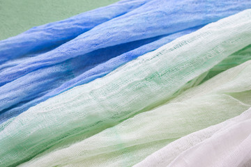 White, green, emerald, blue shades, gauze, dyed fabric, beautiful background