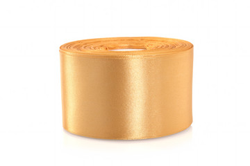 Satin ribbon golden on a reel on a white background