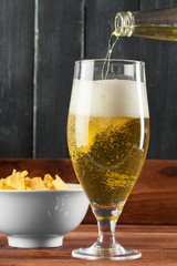 Glass of beer and beer bottle