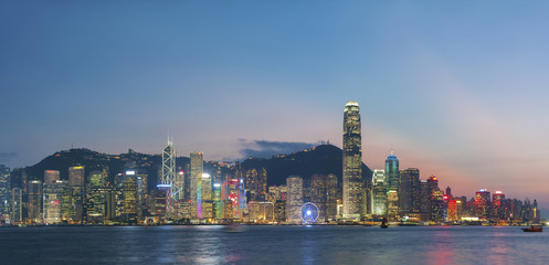 Fototapeta na wymiar Panorama of skyline of Hong Kong city at dusk