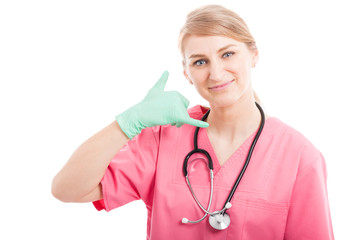 Friendly nice medical nurse making calling gesture