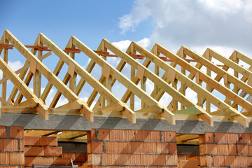 Wooden frame truss system of the roof building - obrazy, fototapety, plakaty