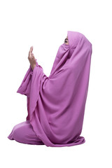Naklejka premium Side view of asian muslim woman wearing hijab praying