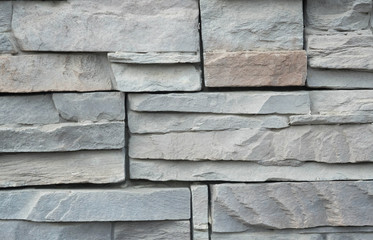 The wall made from stone.