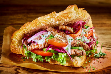 Speciality Turkish doner kebab on pita bread