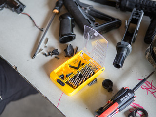 Equipment technician on wood table