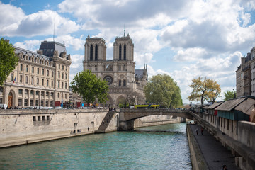 Fototapeta na wymiar Embankment of the river Seine and Cathedral Notre Dame de Paris
