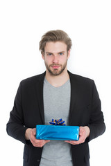 businessman holding blue gift box