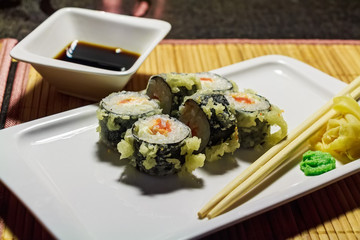 Hot fried Japanese rolls on plate