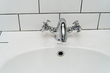 Modern bathroom washbasin with chrome faucet