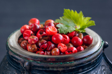 Peruvian pepper in old bowl