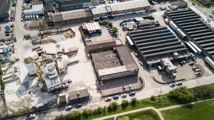 Behang Industrieel gebouw Industrial Estate in North London with factories, warehouses and a cement works in view.
