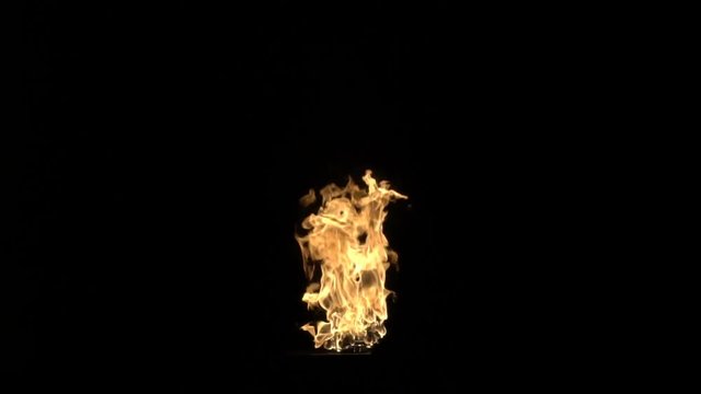 Slow motion burning gas flame blast isolated on black background.