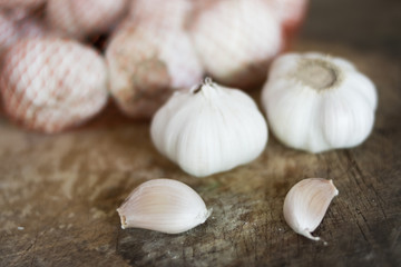 fresh garlic on wooden background