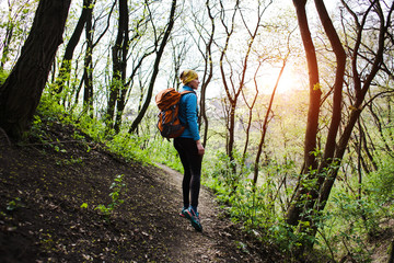 Naklejka premium The girl with the backpack.