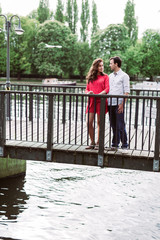Couple standing on the bridge