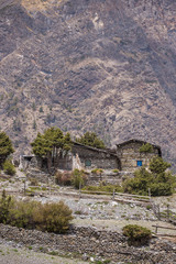 Fototapeta na wymiar Traditional stone buildings in Muktinath village in Upper Mustang area, Nepal