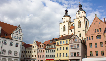 Fototapeta na wymiar renaissance houses / Renaissance houses on the market square in Wittenberg