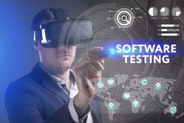 Business, Technology, Internet and network concept. Young businessman working in virtual reality glasses sees the inscription: Software testing
