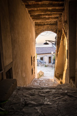 Pictureque view of a little street of Castellabate, ancient town in Cilento (Italy) at sunset.