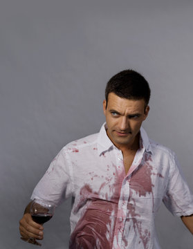 Man With Red Wine On His Shirt