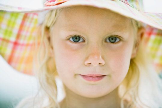 young girl in sun hat