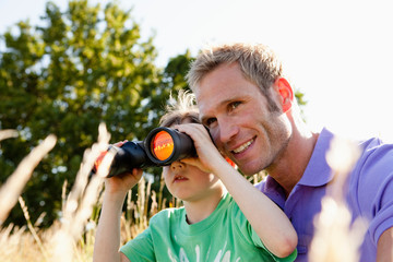 Father and Son With Binoculars