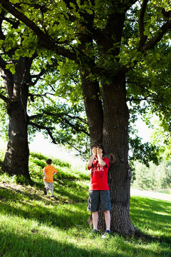 Two Boys Playing Hide and Seek