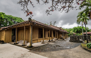 Old Japanese style house with gray cloud