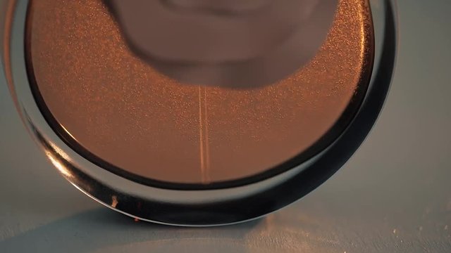 Bubbles in perfume. Slow motion in four times.
