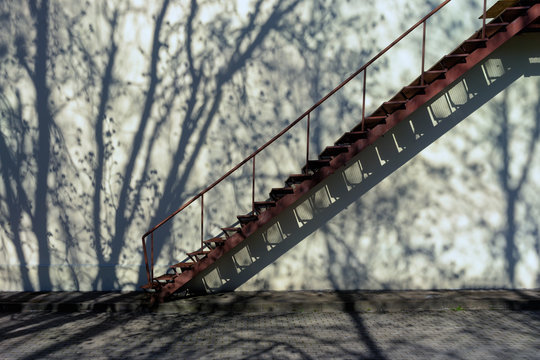 Stairs up the wall with shadow