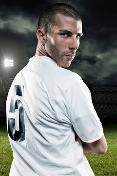 Soccer player looking over his shoulder