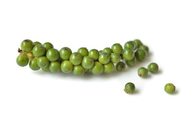 Fresh green peppercorn on white background - isolated