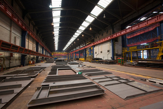 Steel parts in warehouse at shipyard