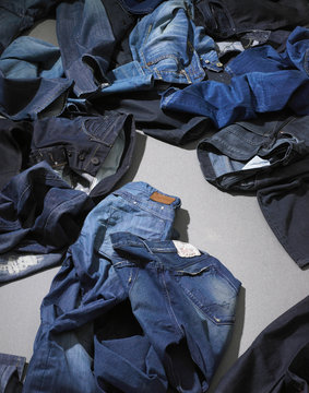 Pile of blue jeans