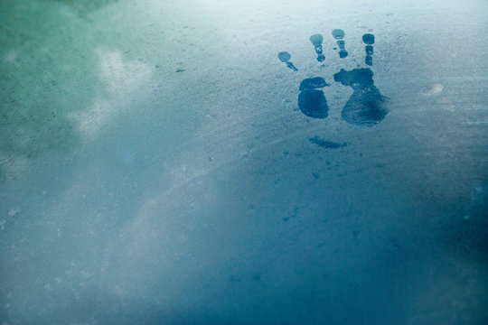 Handprint On Car Window