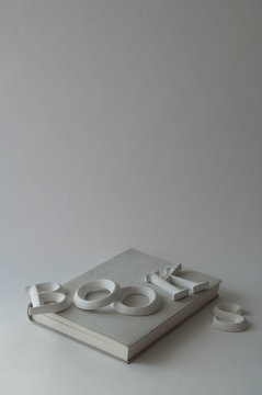 White book with the word 'books' on it