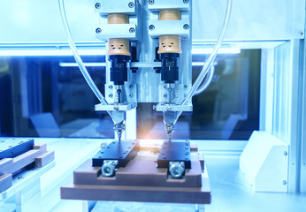 atuomatic screw feeder in cell phone assembly equipment factory.