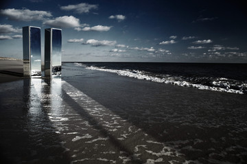 Mirrors on a beach