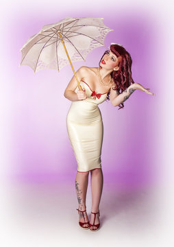 Pin-up girl with umbrella Stock Photo | Adobe Stock