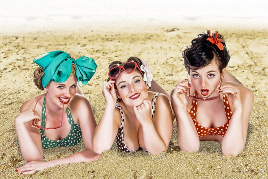 Glamorous young women on the beach, retro style